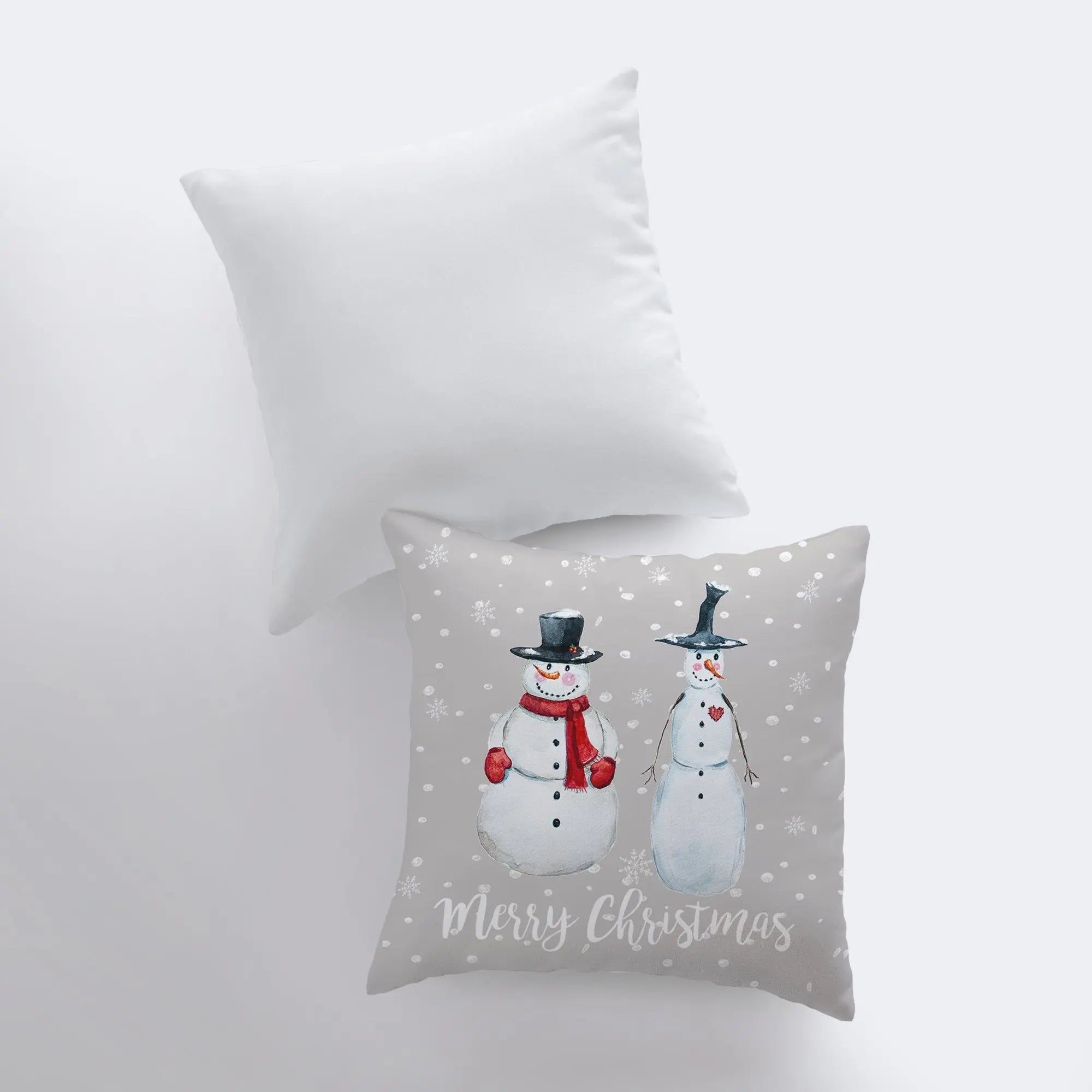 Primitive Snowmen Throw Pillow Cover featuring two snowmen in top hats on a tan gray background, perfect for rustic Christmas decor.