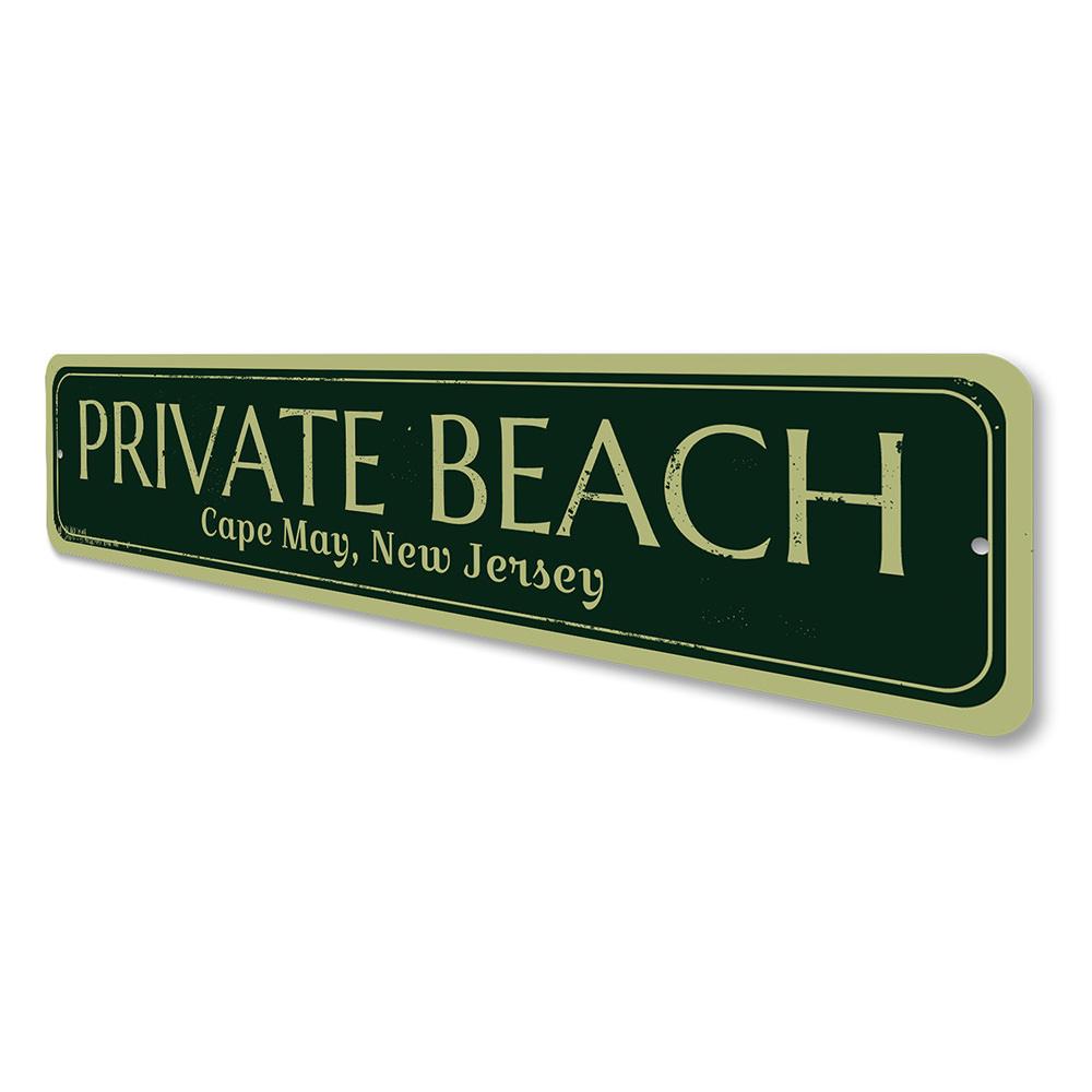 A decorative Private Beach Location Sign made of high-quality aluminum, featuring customizable text and pre-drilled holes for easy mounting.