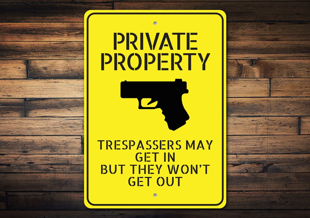 Private Property Trespassers May Get In But Won't Come Out Sign made of durable aluminum, featuring customizable text and pre-drilled holes for easy mounting.