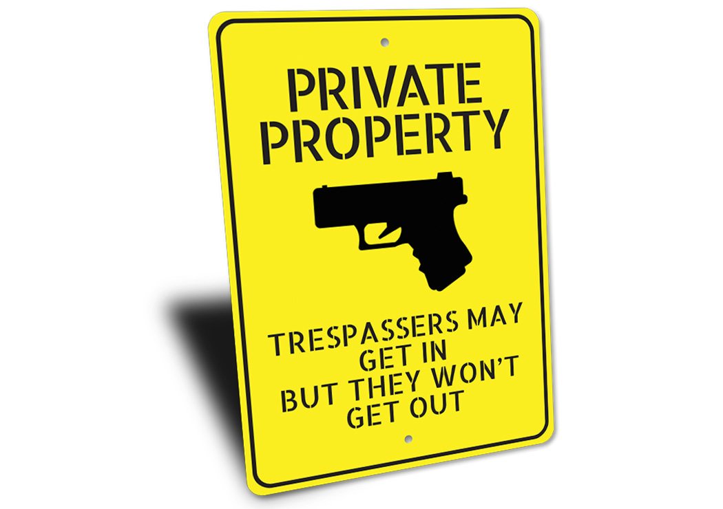 Private Property Trespassers May Get In But Won't Come Out Sign made of durable aluminum, featuring customizable text and pre-drilled holes for easy mounting.