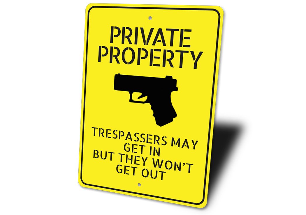 Private Property Trespassers May Get In But Won't Come Out Sign made of durable aluminum, featuring customizable text and pre-drilled holes for easy mounting.