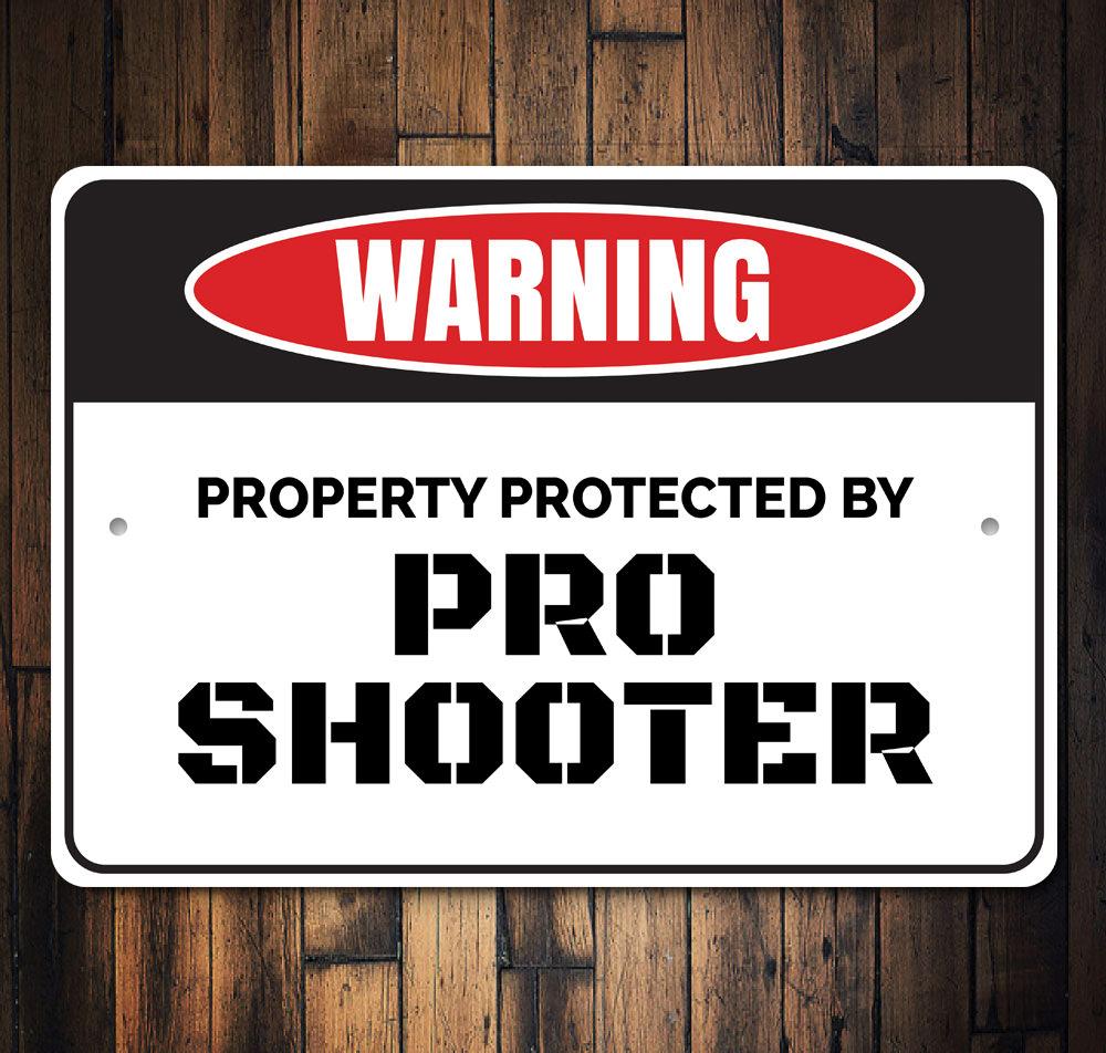 Pro Shooter Sign made of high-quality aluminum, featuring customizable text, ideal for home decor and gifts.