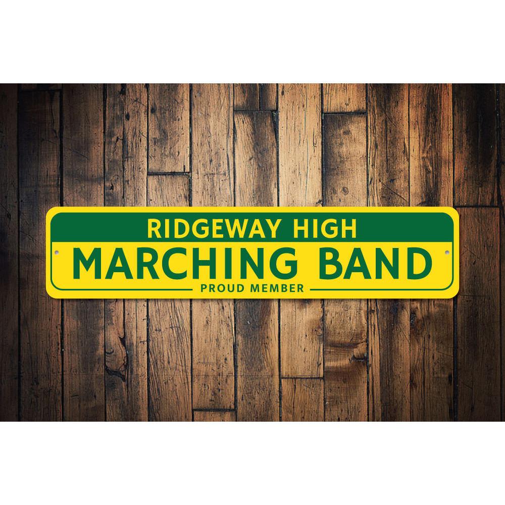 Proud Marching Band Member Sign made of durable aluminum, featuring customizable text and pre-drilled holes for easy mounting.