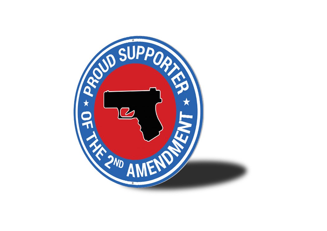 A decorative metal sign displaying the text 'Proud Supporter of the 2nd Amendment', featuring a stylish design suitable for home decor.