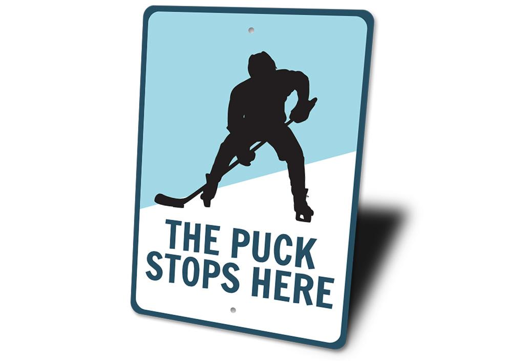 Puck Stops Here Sign made of durable aluminum, featuring a stylish design perfect for home decor.