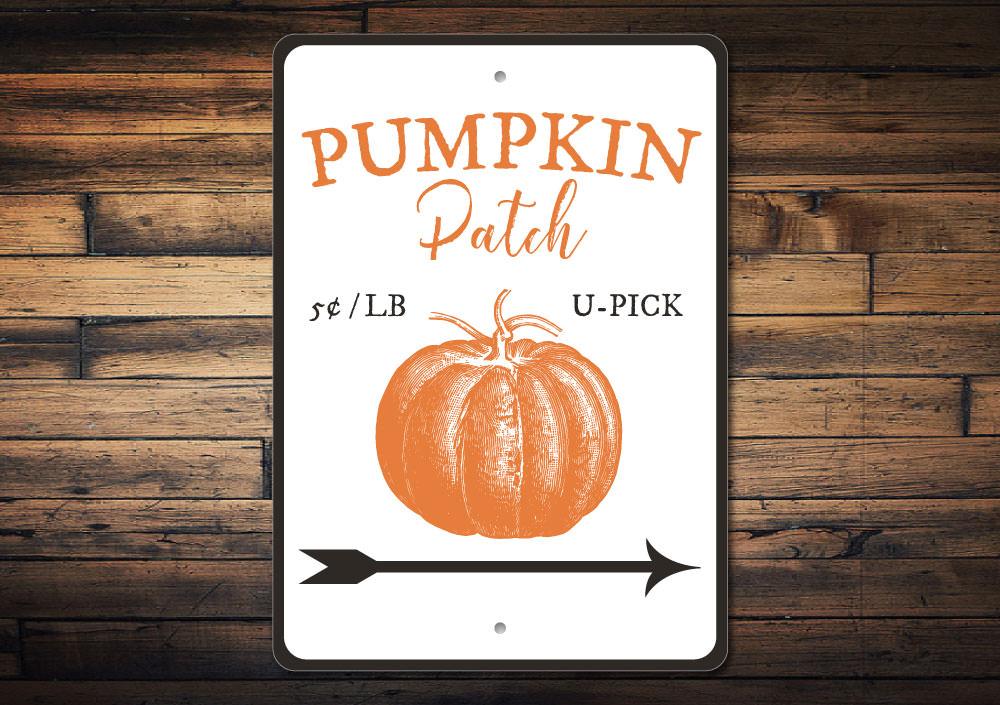 A decorative Pumpkin Patch Sign made of high-quality aluminum, featuring spooky Halloween-themed graphics, perfect for indoor and outdoor decor.