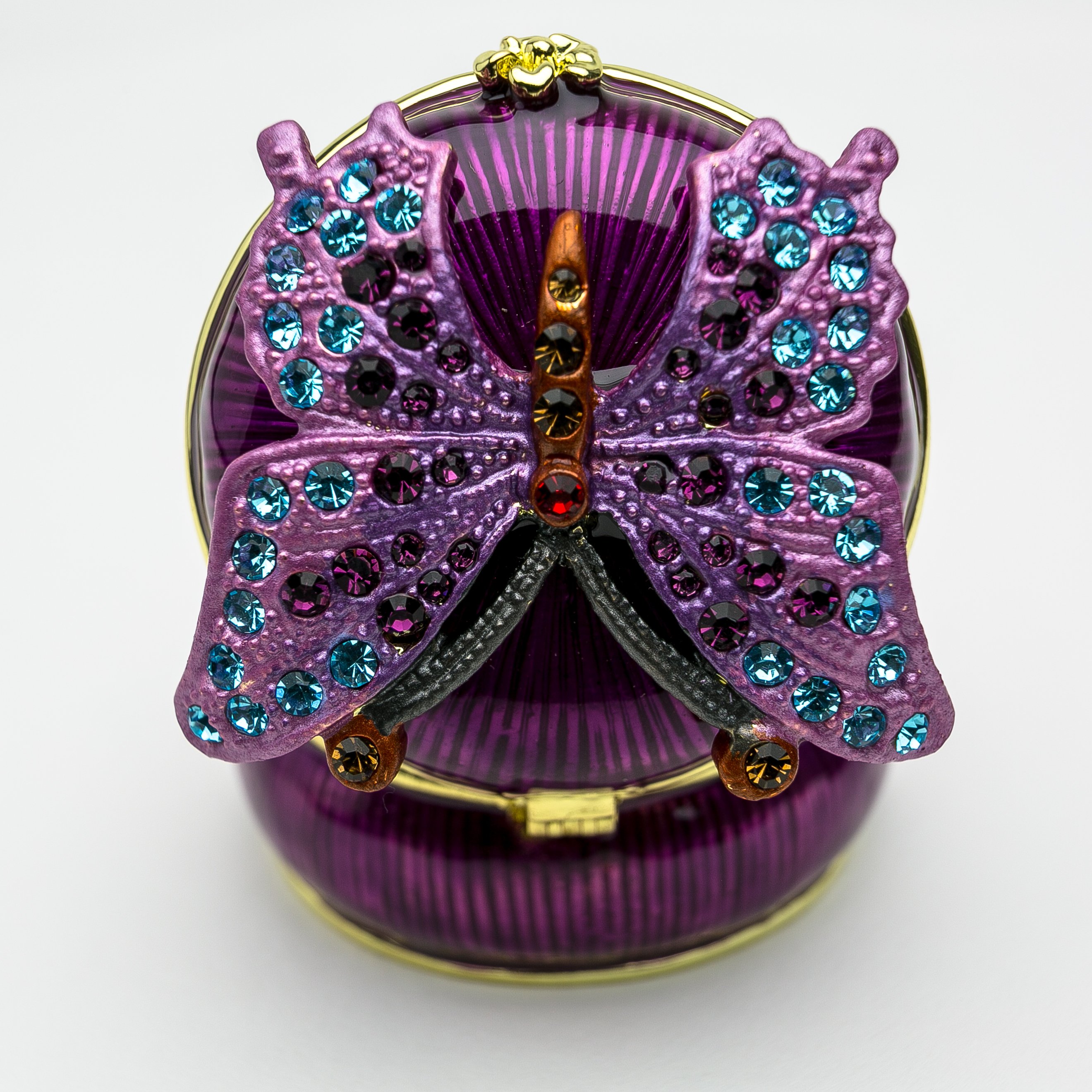 Purple trinket box with butterfly design, adorned with Austrian crystals and gold or silver plating.