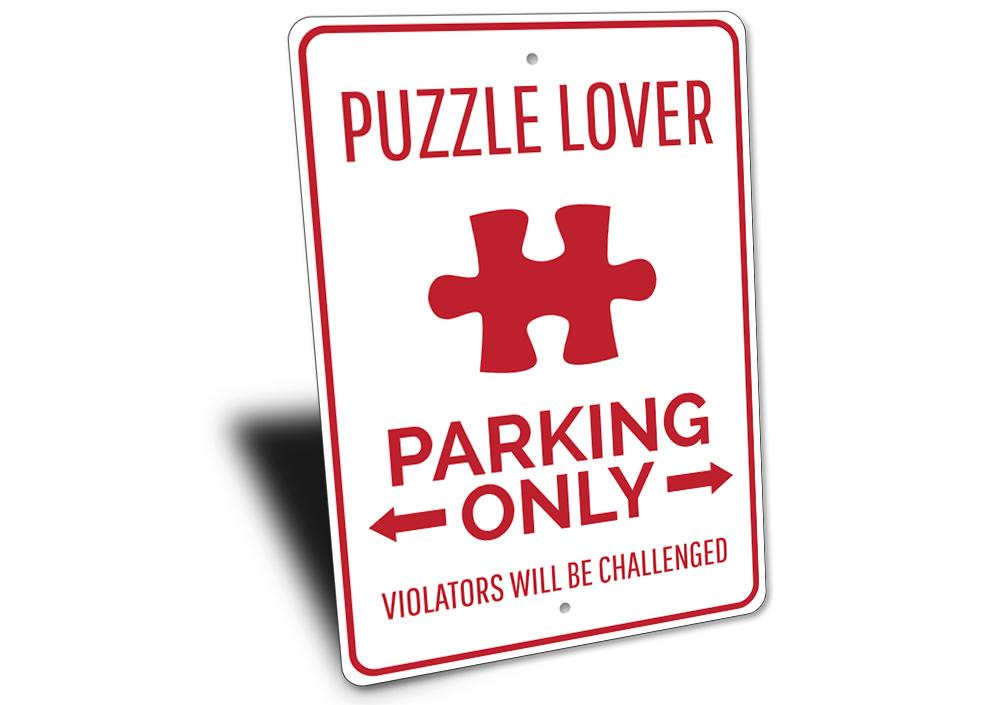 Puzzle Lover Parking Sign made of durable aluminum, featuring customizable text and pre-drilled holes for easy mounting.