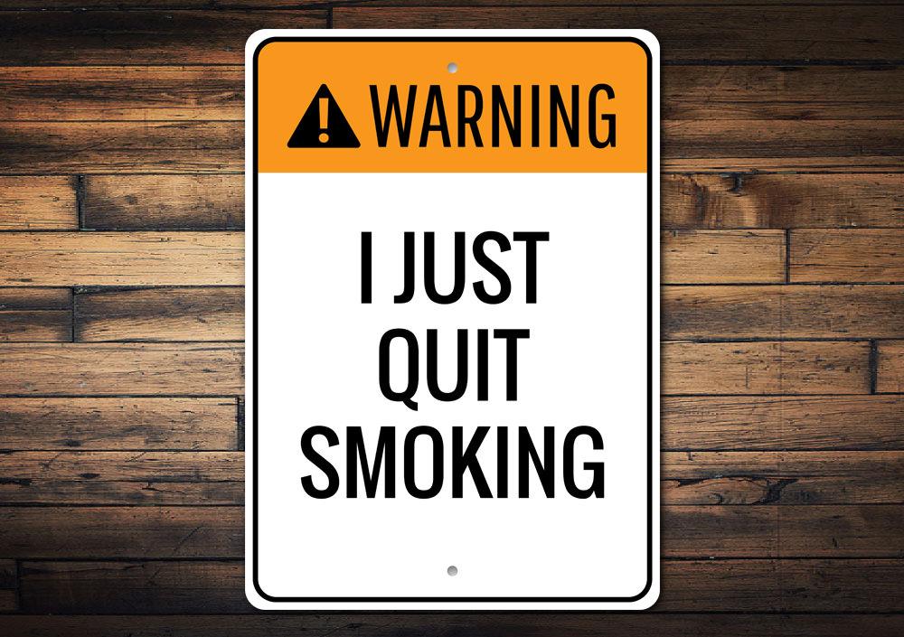 A decorative Quit Smoking Sign made of durable aluminum, featuring customizable text and pre-drilled holes for easy mounting.