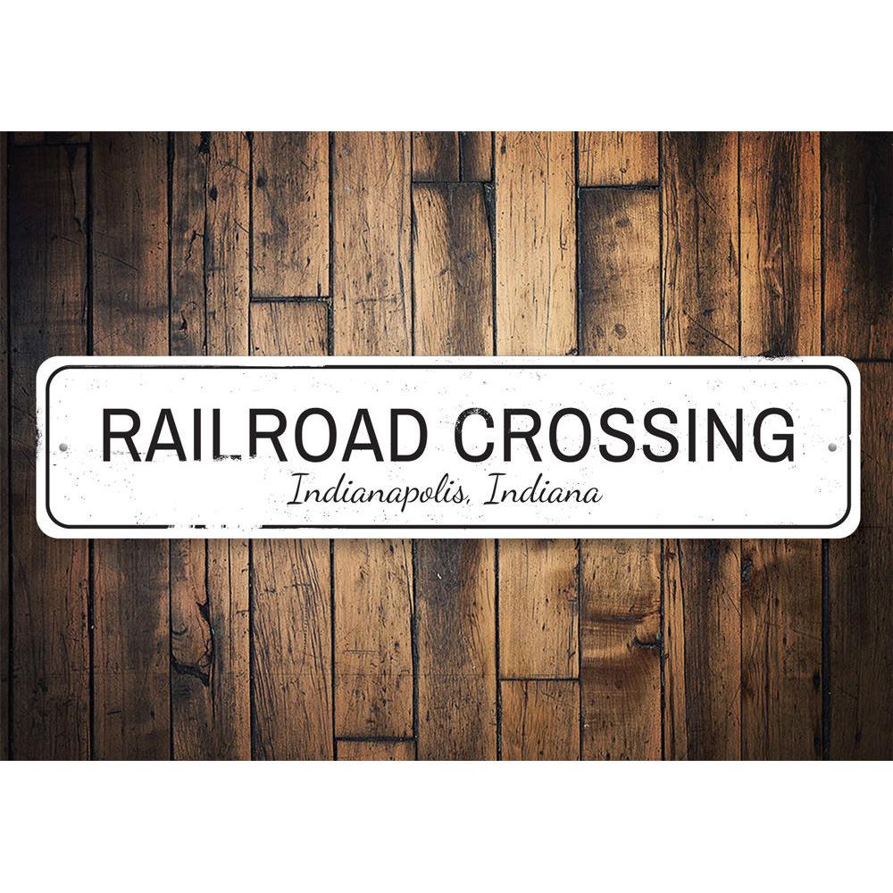 A decorative Railroad Crossing Sign made of high-quality aluminum, featuring a classic design suitable for home or garage decor.