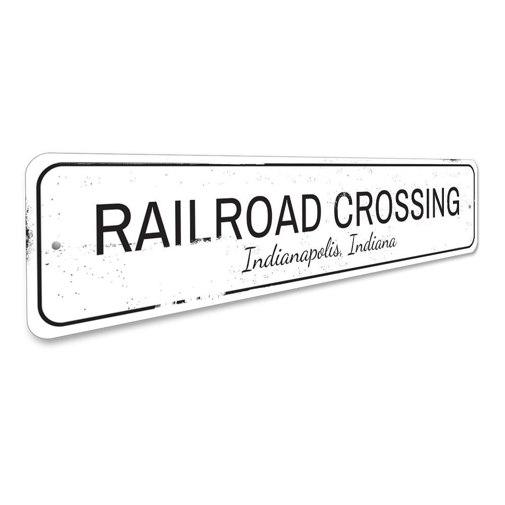 A decorative Railroad Crossing Sign made of high-quality aluminum, featuring a classic design suitable for home or garage decor.