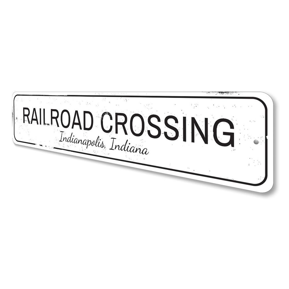 A decorative Railroad Crossing Sign made of high-quality aluminum, featuring a classic design suitable for home or garage decor.