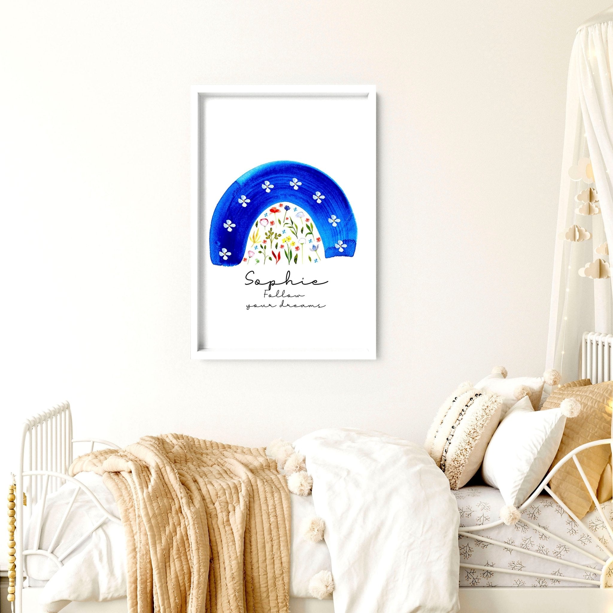 A beautiful watercolour floral rainbow wall art print in soft blue tones, perfect for nursery decoration.