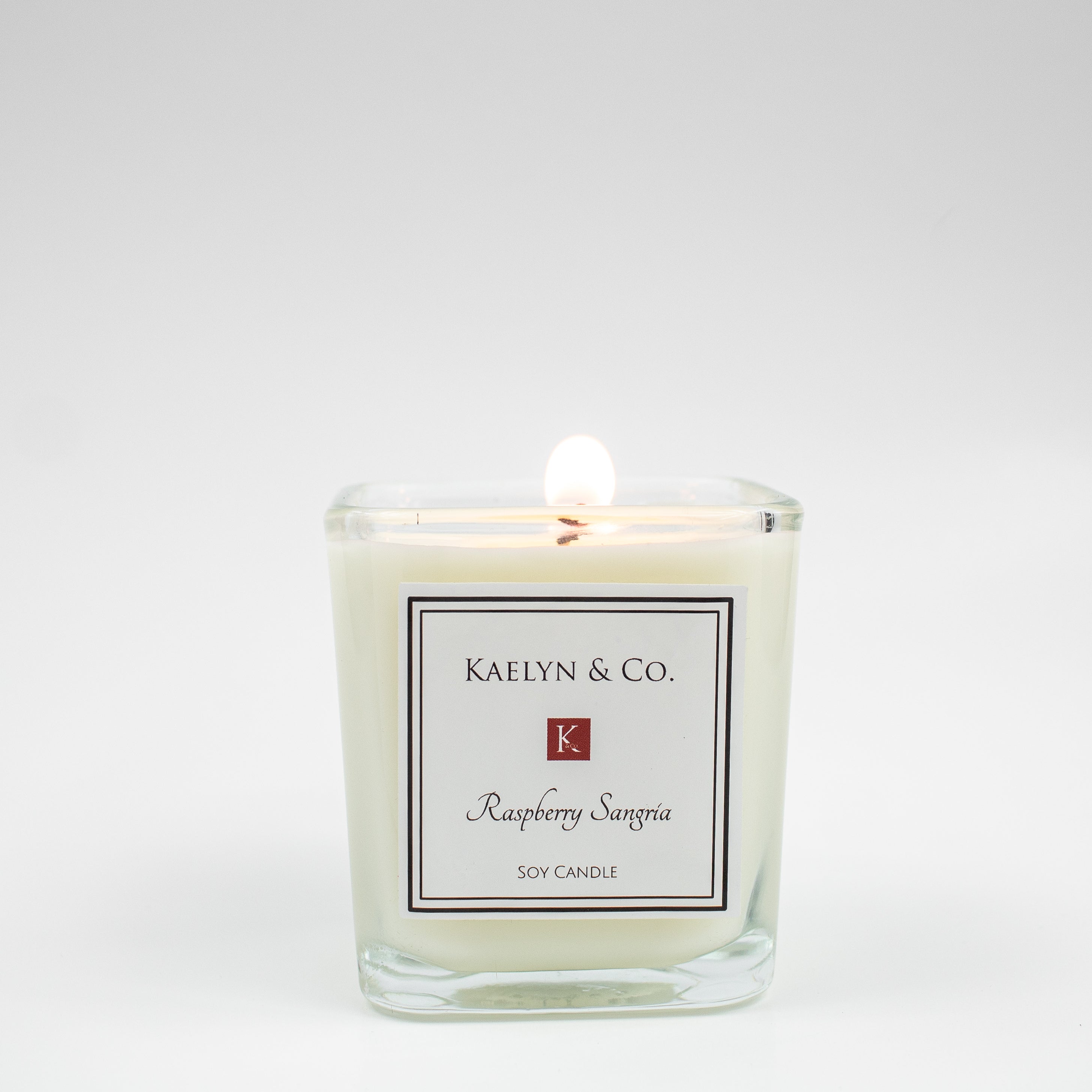 Raspberry Sangria Small Cube Candle with fruity scent, elegantly designed in a cube shape, hand poured with natural soy wax.