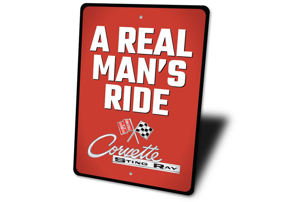 Real Man's Ride Corvette Sign made of durable aluminum, featuring vibrant colors and a classic design, perfect for car enthusiasts.