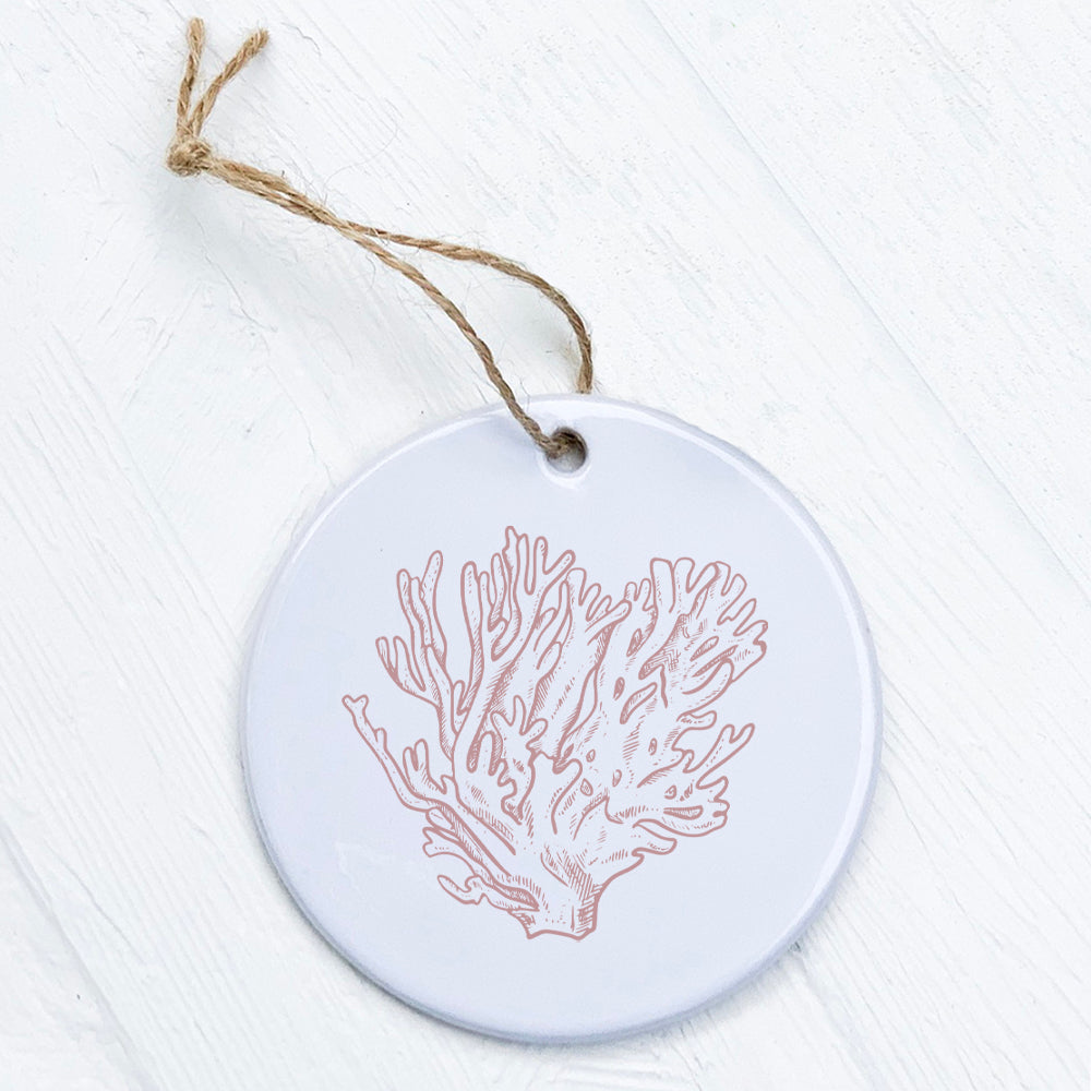 A beautifully crafted Red Coral porcelain ornament with a vibrant design, showcasing a smooth glossy finish.