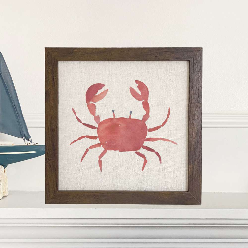 A beautifully framed Red Crab sign with a linen-look background, showcasing eco-friendly ink printing.