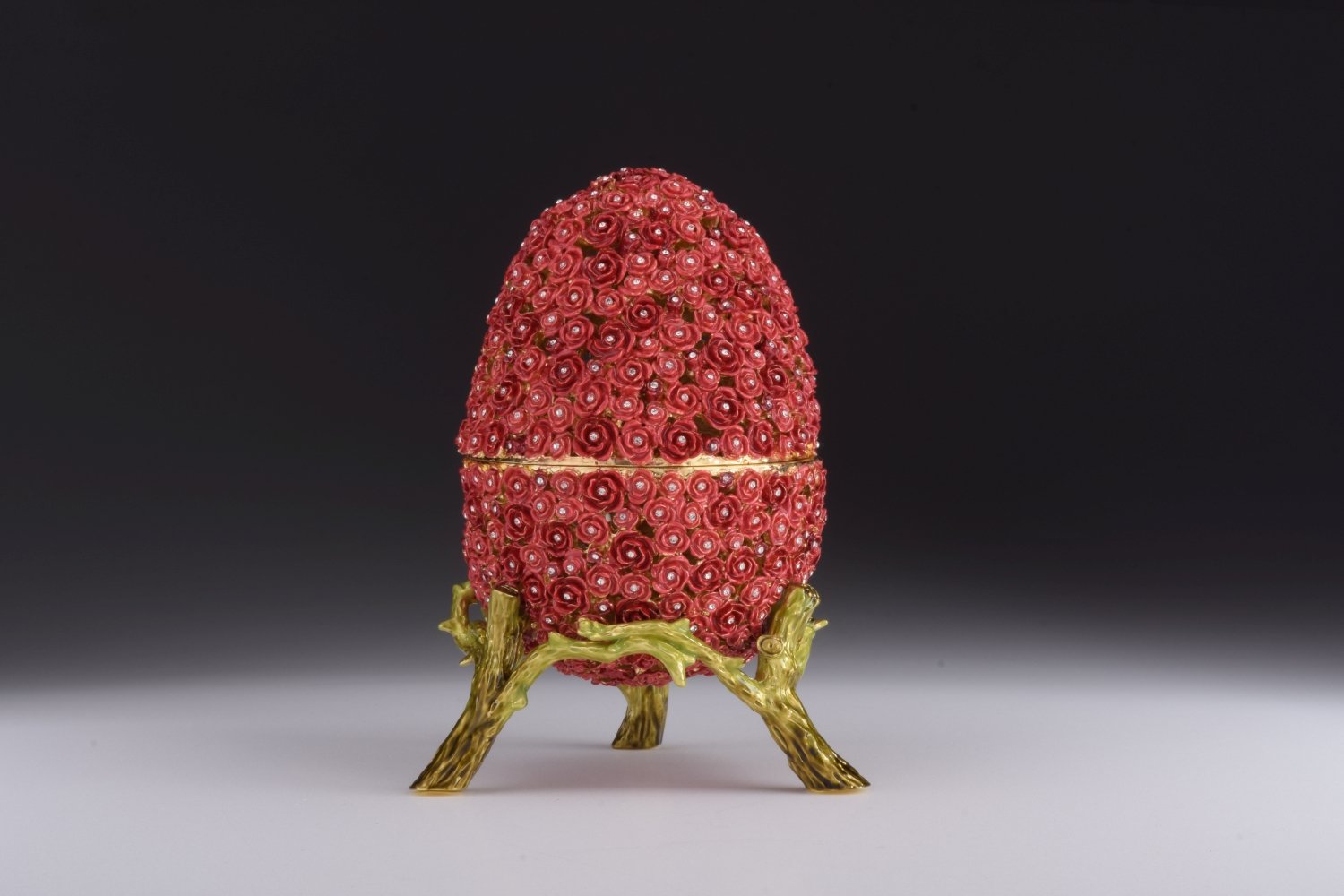 A beautifully crafted Red Flowers Faberge Egg trinket box, adorned with Austrian crystals and plated with 24K gold, showcasing intricate enamel work.