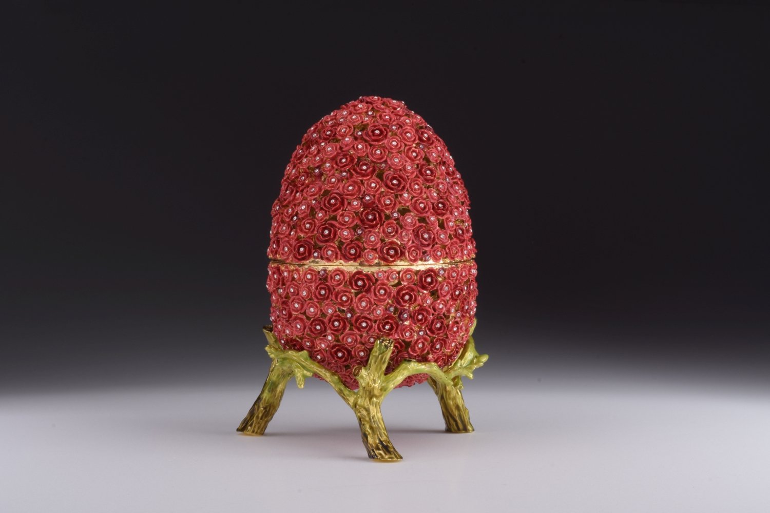 A beautifully crafted Red Flowers Faberge Egg trinket box, adorned with Austrian crystals and plated with 24K gold, showcasing intricate enamel work.