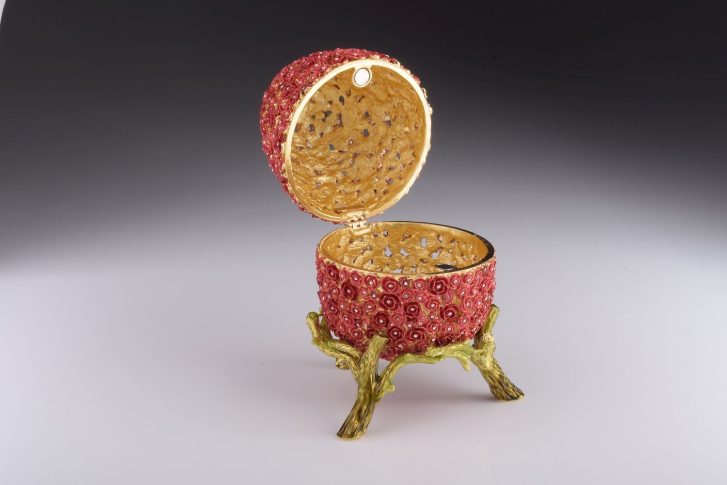 A beautifully crafted Red Flowers Faberge Egg trinket box, adorned with Austrian crystals and plated with 24K gold, showcasing intricate enamel work.