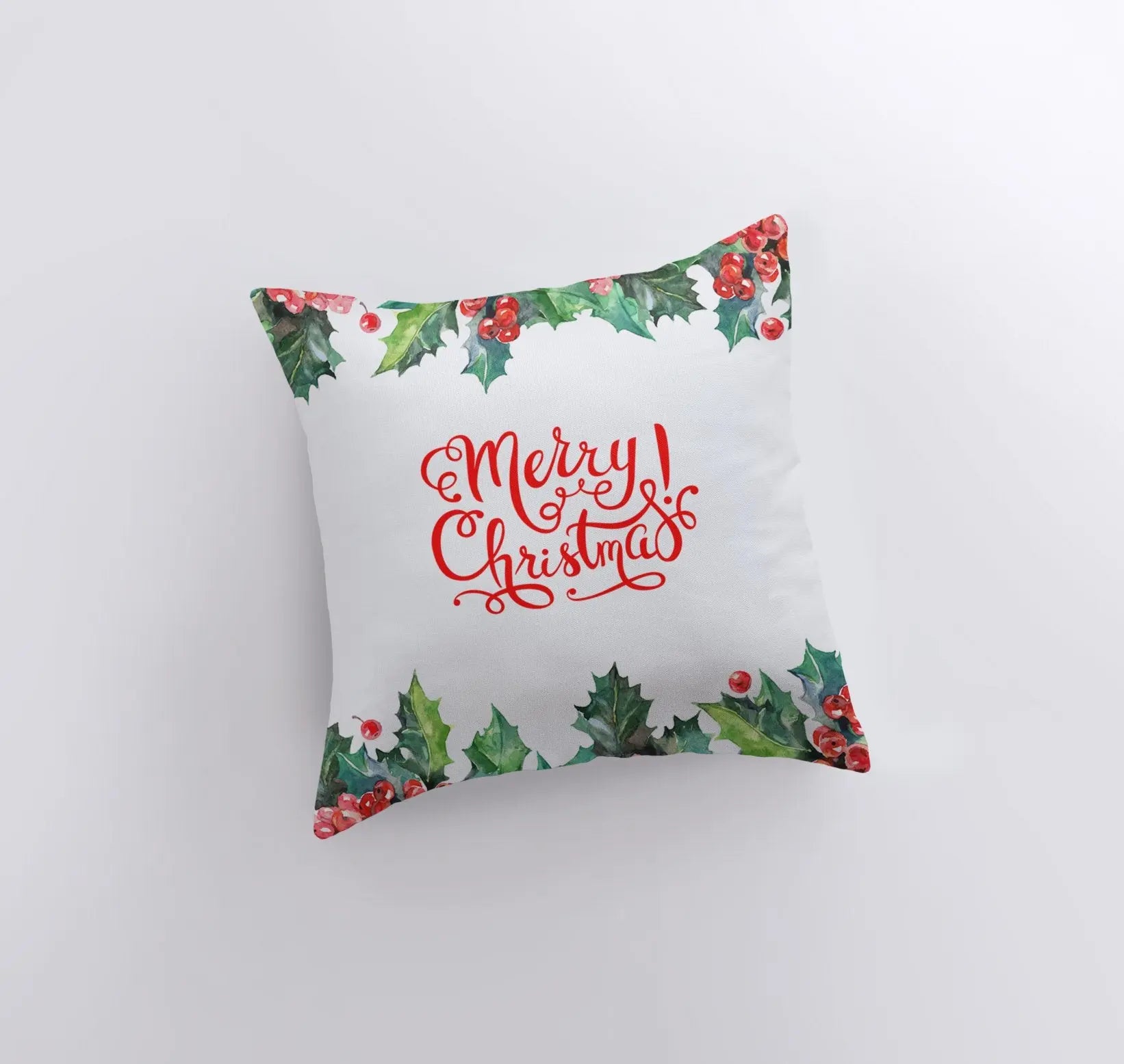 Red Merry Christmas Holly pillow cover featuring elegant cursive text and holly berry design on a white background.