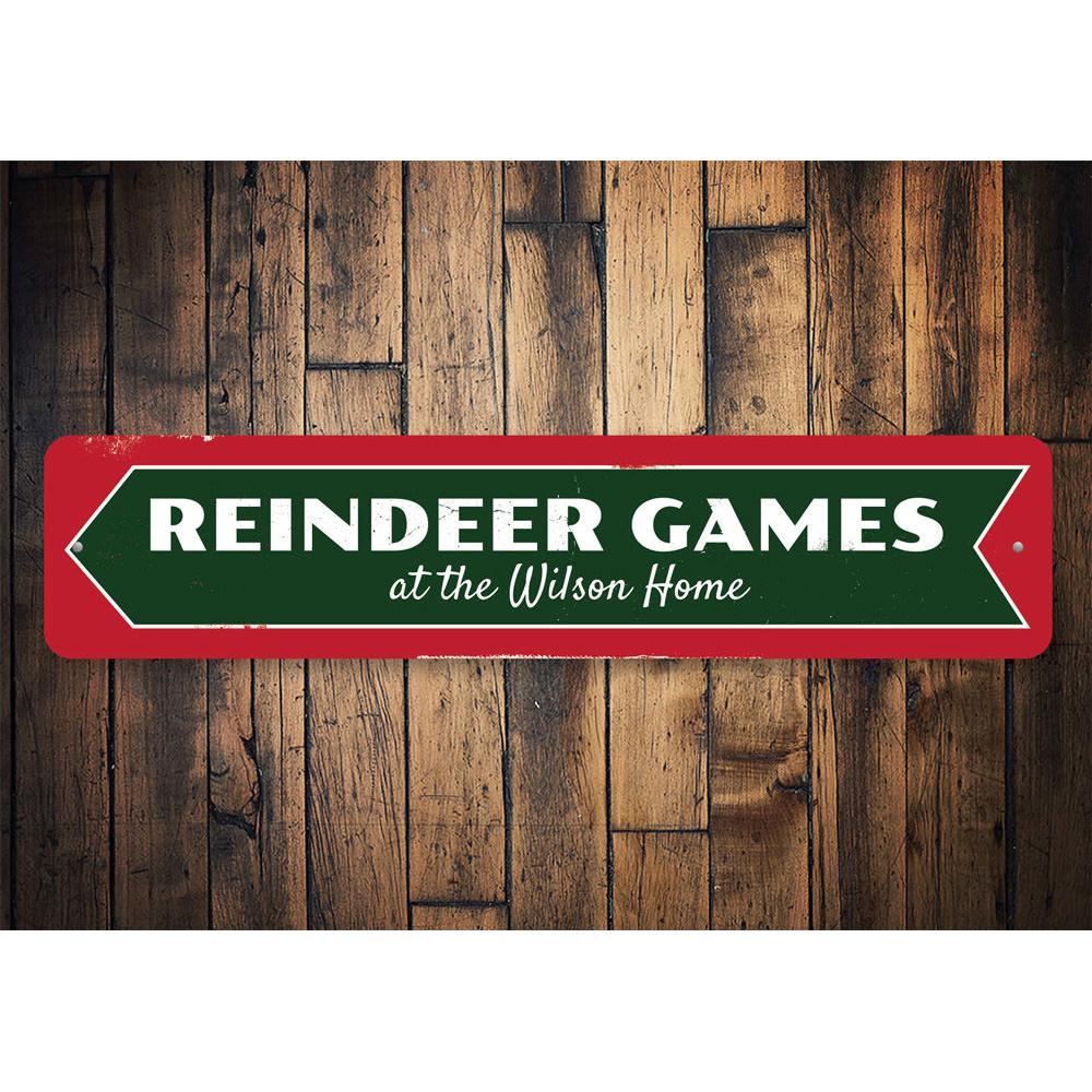 A festive Reindeer Games Sign made of high-quality aluminum, featuring a charming holiday design perfect for Christmas decorations.