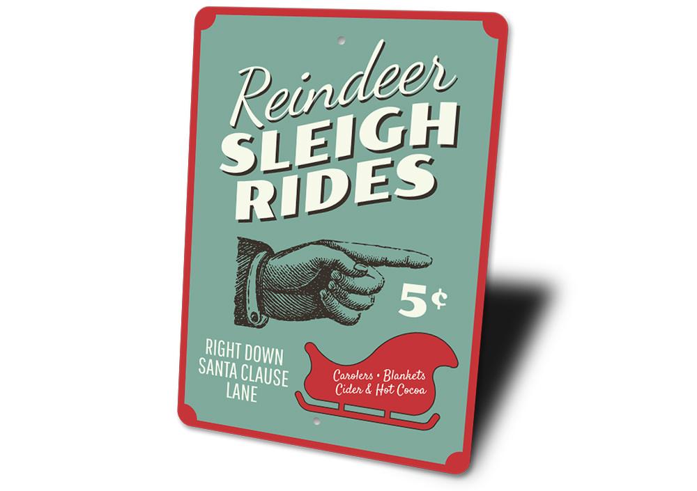 A festive Reindeer Sleigh Rides Sign made of high-quality aluminum, featuring a charming design perfect for Christmas decorations.