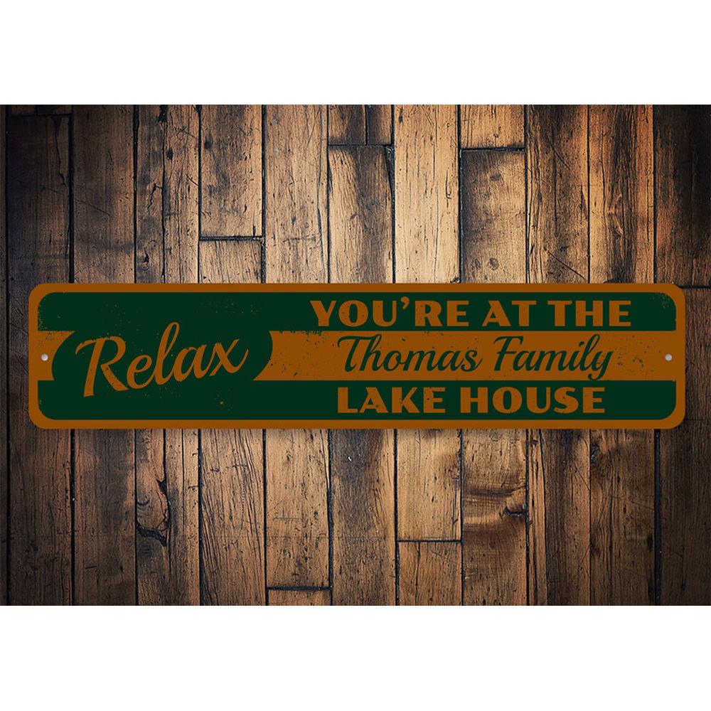 A beautifully crafted Relax Lake Sign made of durable aluminum, featuring customizable text and pre-drilled holes for easy mounting, perfect for lakehouse decor.