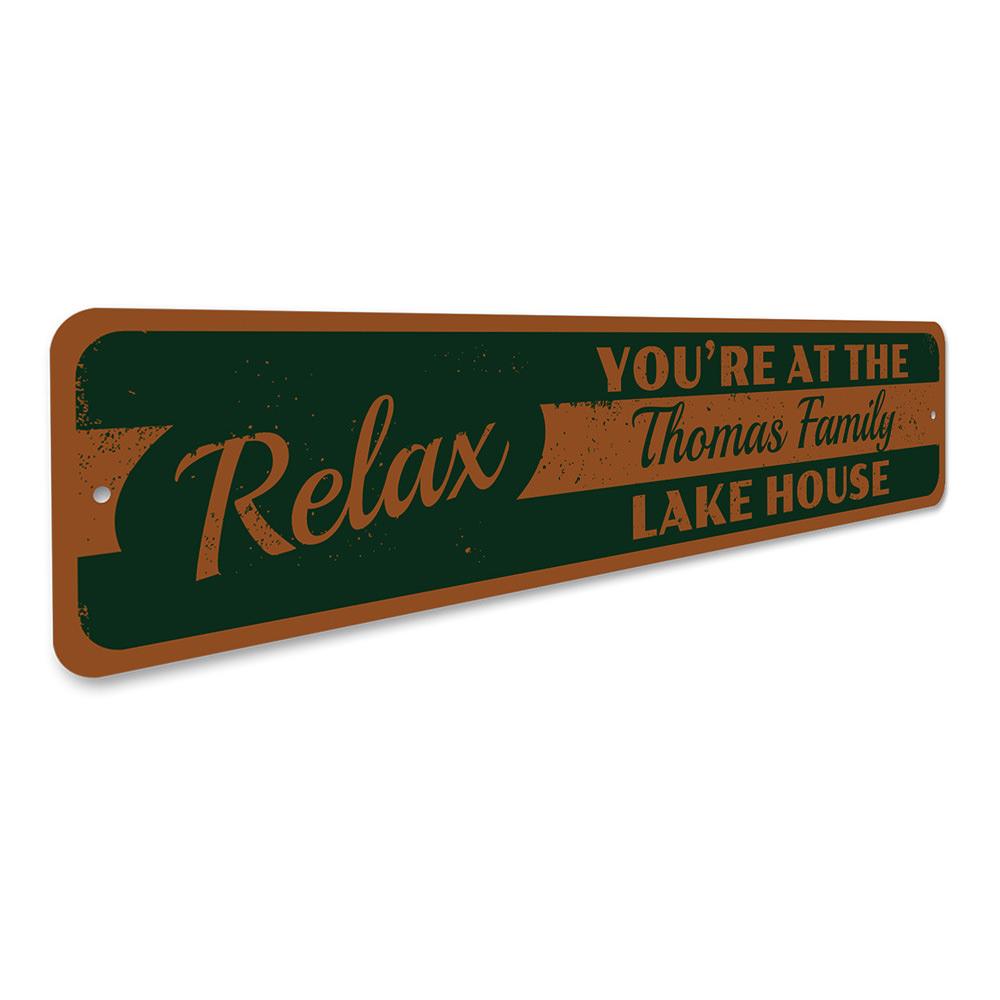 A beautifully crafted Relax Lake Sign made of durable aluminum, featuring customizable text and pre-drilled holes for easy mounting, perfect for lakehouse decor.