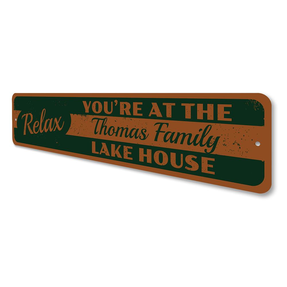 A beautifully crafted Relax Lake Sign made of durable aluminum, featuring customizable text and pre-drilled holes for easy mounting, perfect for lakehouse decor.