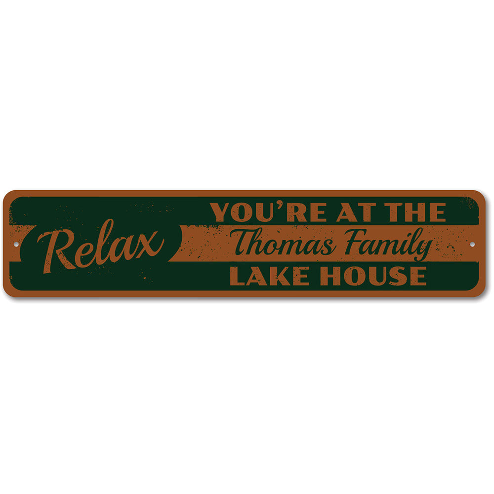 A beautifully crafted Relax Lake Sign made of durable aluminum, featuring customizable text and pre-drilled holes for easy mounting, perfect for lakehouse decor.