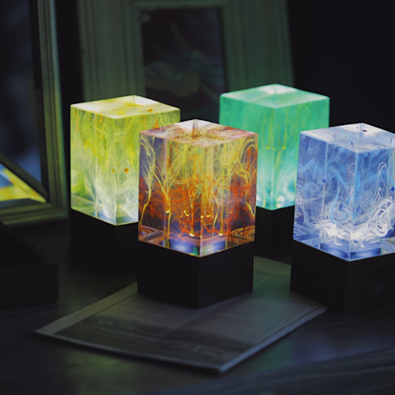 Aurora resin table decor featuring a unique handcrafted design with warm white LED light, perfect for home decoration.