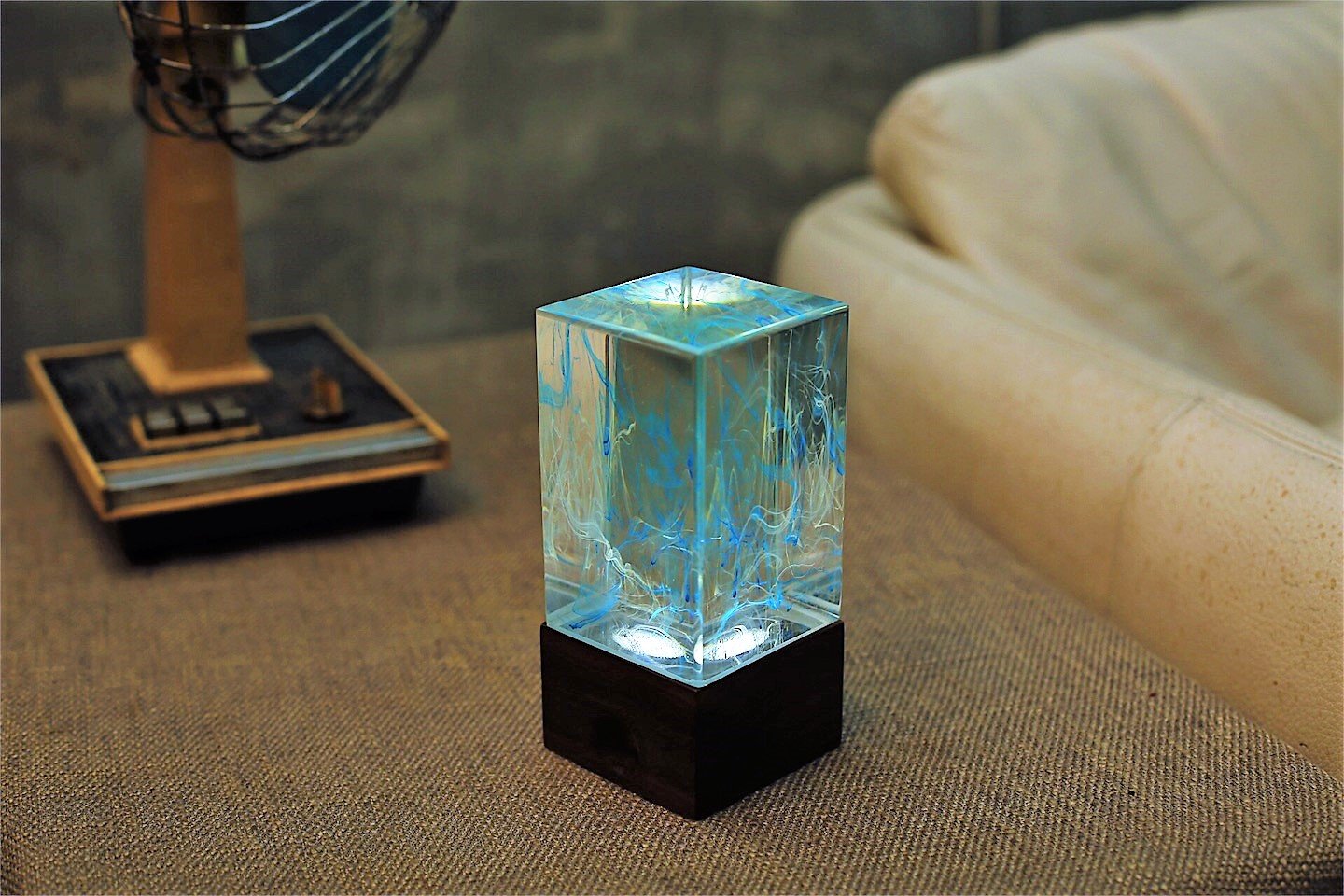 Handcrafted Ocean Resin Table Decor with warm white LED light, showcasing unique ocean-inspired design and vibrant colors.