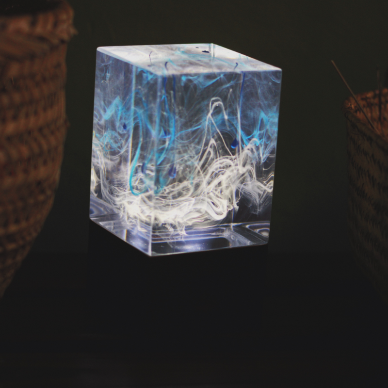 Handcrafted Ocean Resin Table Decor with warm white LED light, showcasing unique ocean-inspired design and vibrant colors.