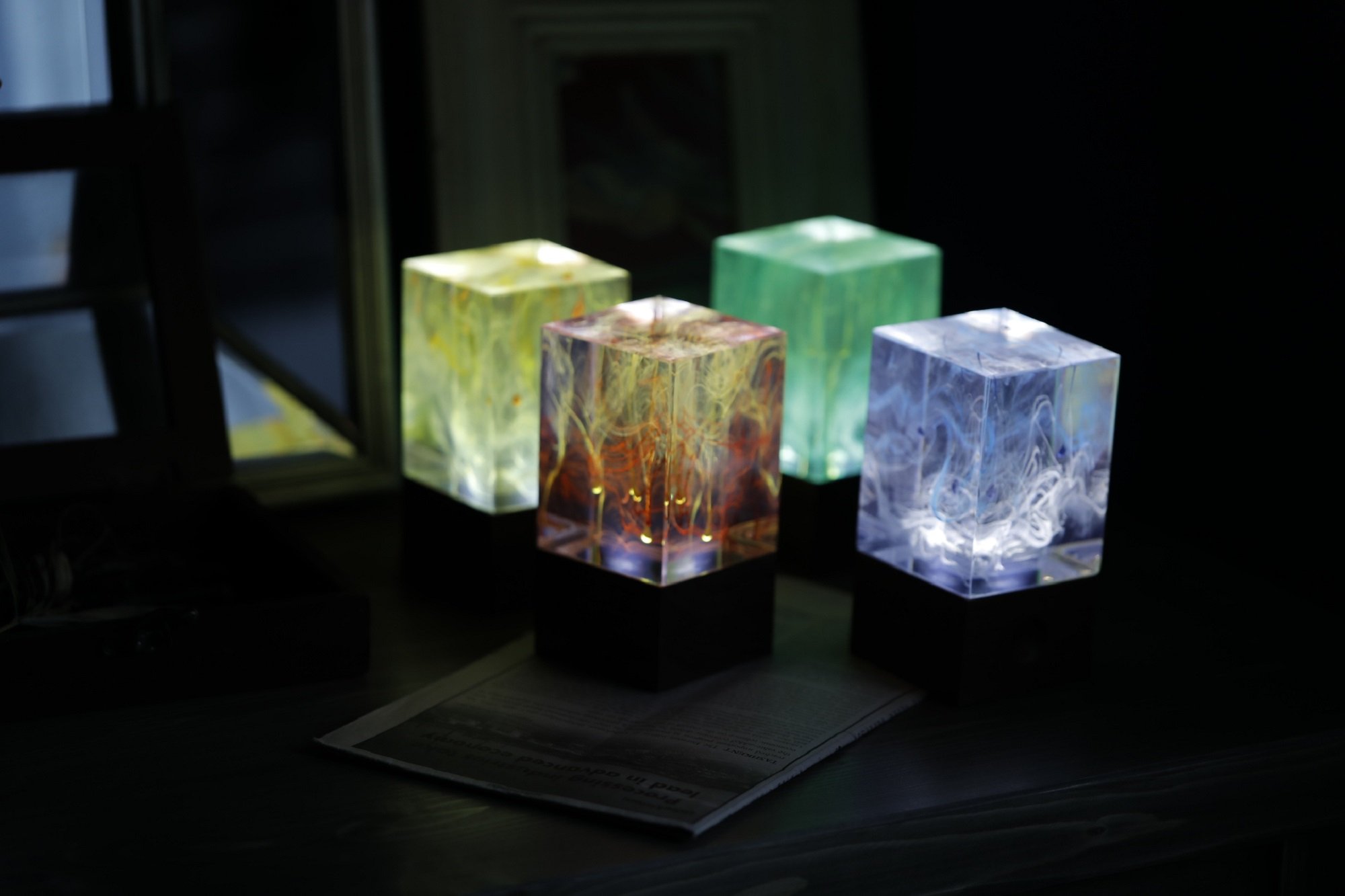 Handcrafted Ocean Resin Table Decor with warm white LED light, showcasing unique ocean-inspired design and vibrant colors.