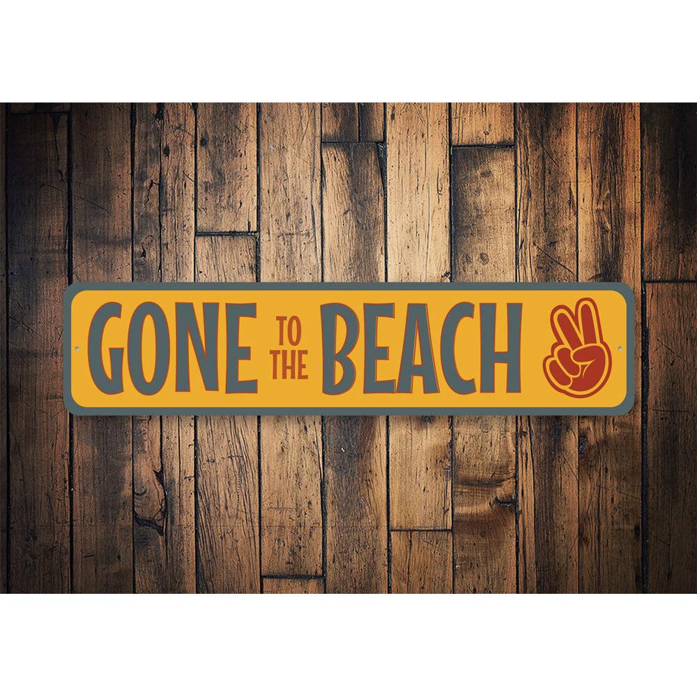 A vibrant Retro Beach Sign made of quality aluminum, featuring a nostalgic beach design perfect for home decor.