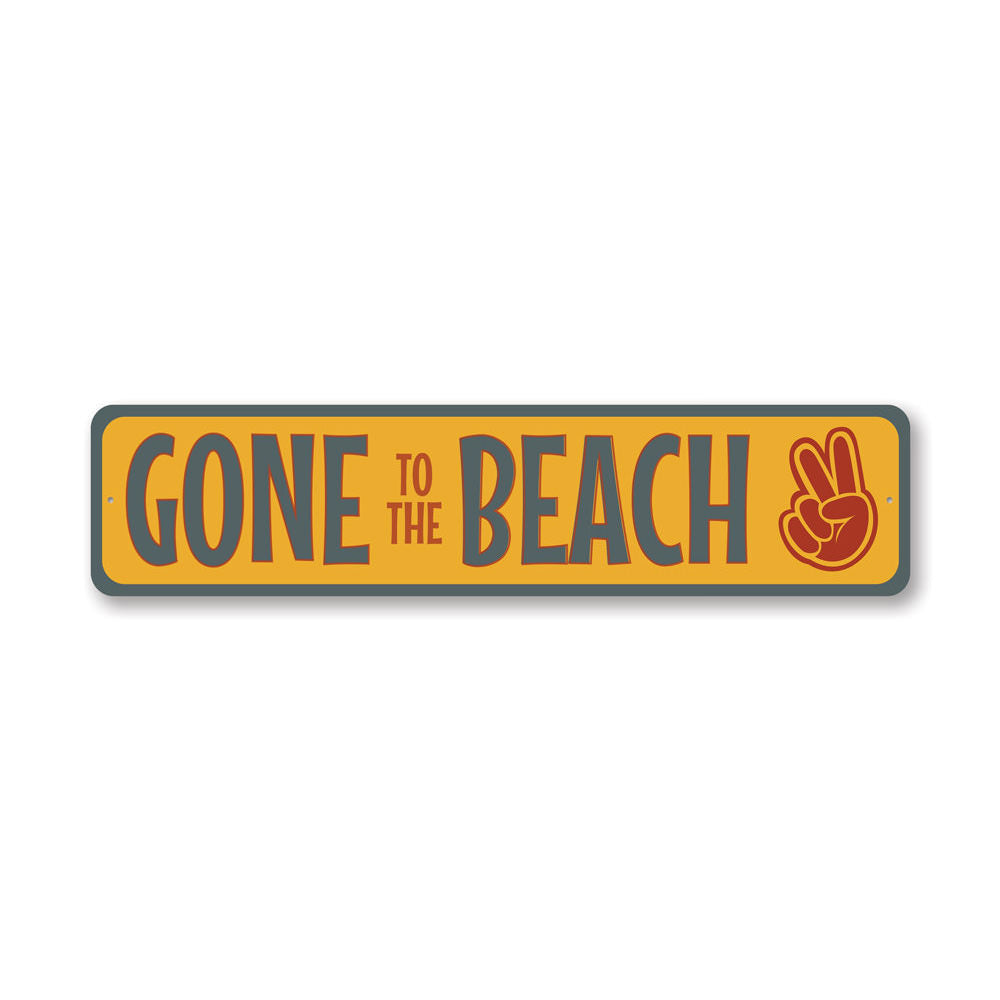 A vibrant Retro Beach Sign made of quality aluminum, featuring a nostalgic beach design perfect for home decor.