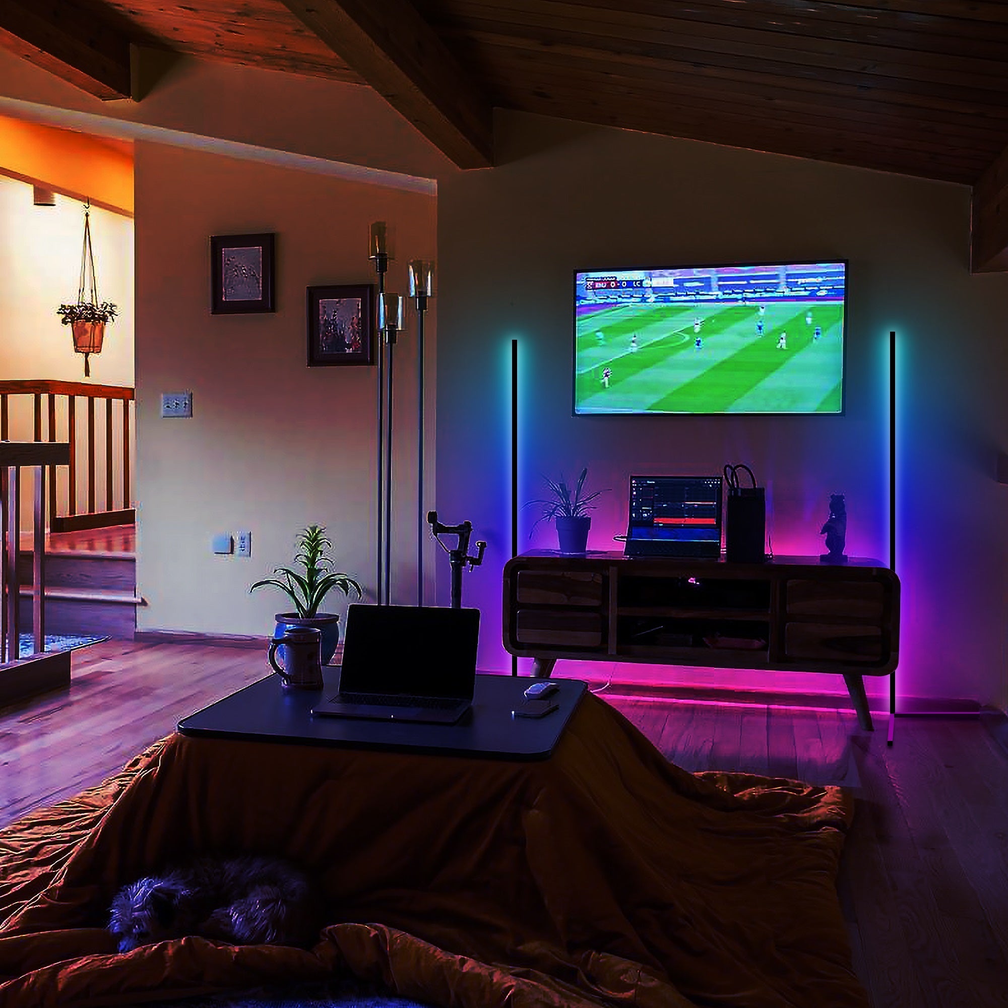 RGB LED Corner Floor Lamp in a modern living room setting, showcasing vibrant colors and minimalist design.