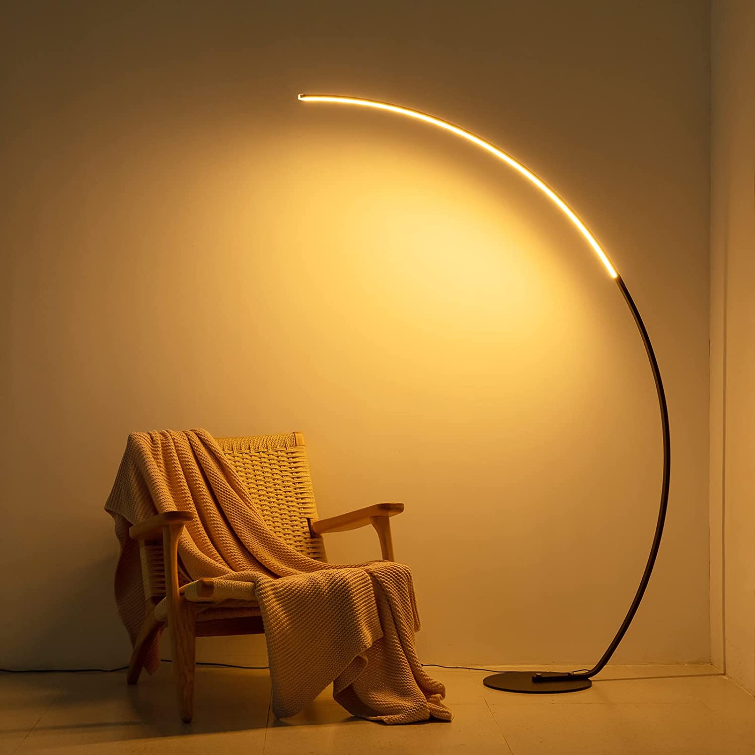 RGBW Modern Curve Floor Lamp in black, showcasing its sleek design and vibrant color options.