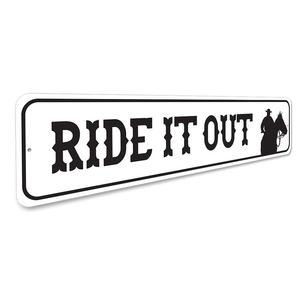 A decorative Ride It Out Sign made of high-quality aluminum, featuring a rustic design suitable for barns and farmhouse decor.