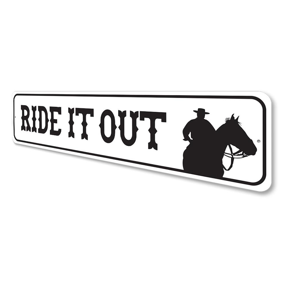 A decorative Ride It Out Sign made of high-quality aluminum, featuring a rustic design suitable for barns and farmhouse decor.