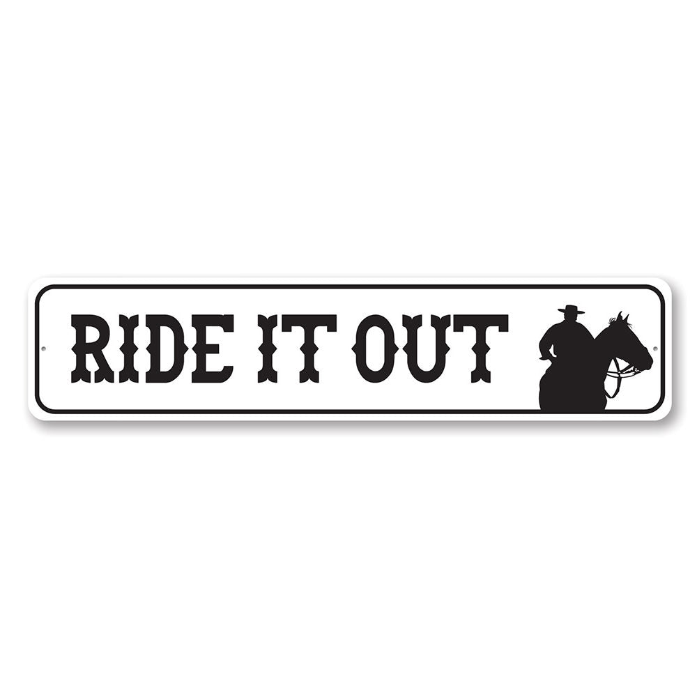 A decorative Ride It Out Sign made of high-quality aluminum, featuring a rustic design suitable for barns and farmhouse decor.