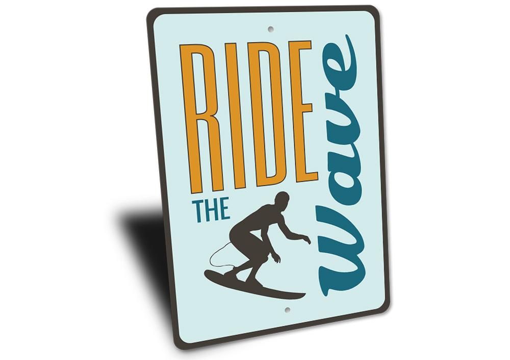 Custom Ride the Wave sign made of durable aluminum, featuring beach-themed design, perfect for coastal decor.