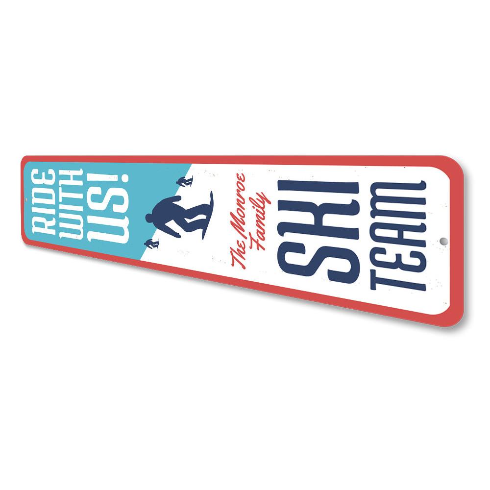 A decorative Ride With Us Skiing Sign made of high-quality aluminum, featuring a skiing theme, perfect for home or man cave decor.