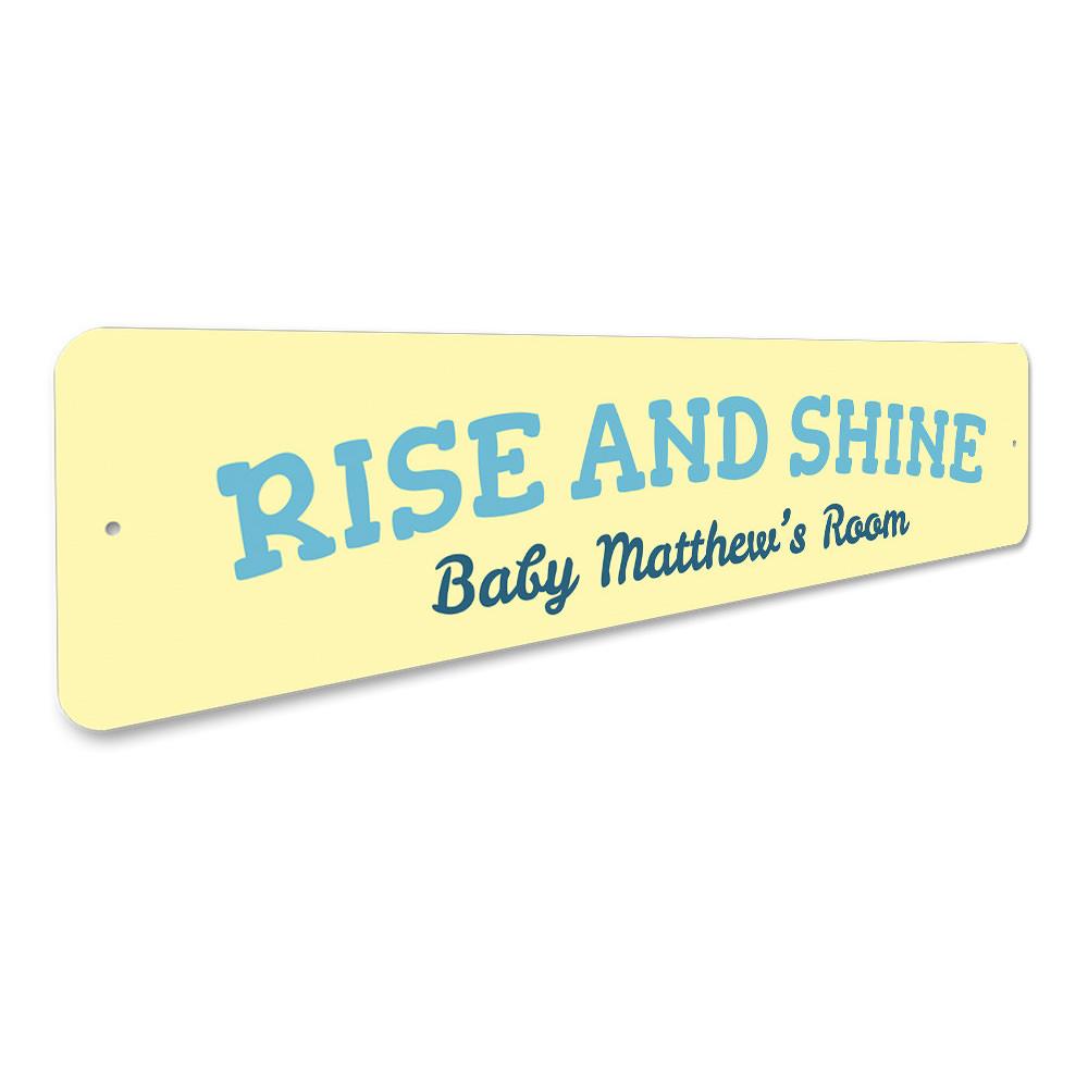 A colorful Rise and Shine Sign made of high-quality aluminum, featuring customizable text and playful designs, perfect for kids' rooms.