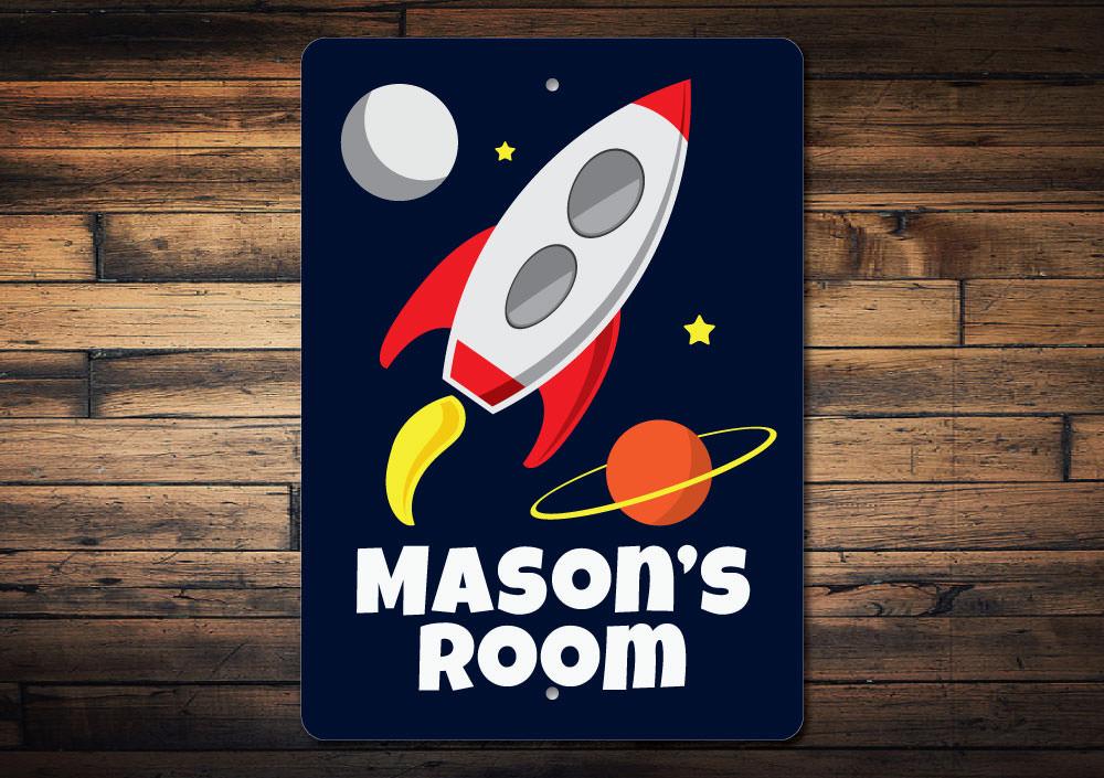 A colorful Rocket Sign made of high-quality aluminum, featuring customizable text, perfect for kids' rooms and unique gifts.