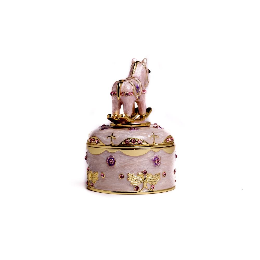 A beautifully crafted Rocking Horse Music Box, featuring enamel painting and adorned with sparkling Austrian crystals, plated in 24K gold.