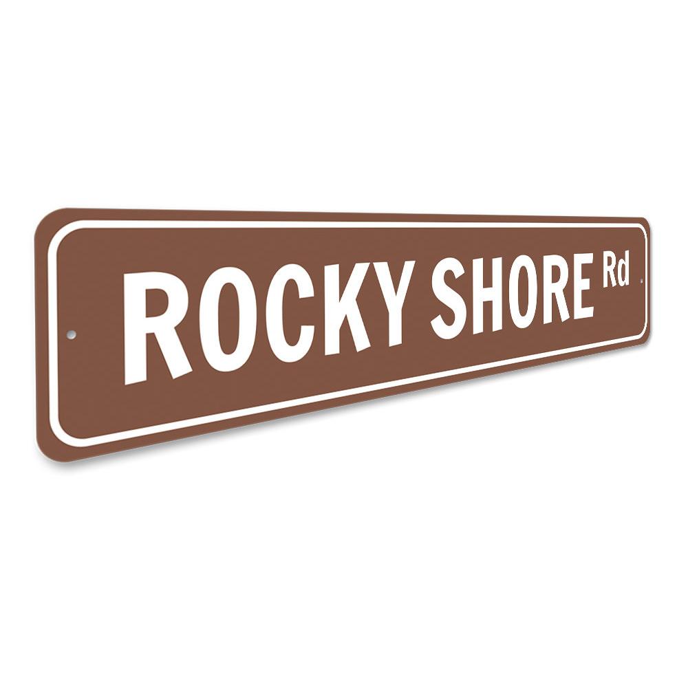 Rocky Shore Road Sign made of high-quality aluminum, featuring a coastal design perfect for beach-themed decor.