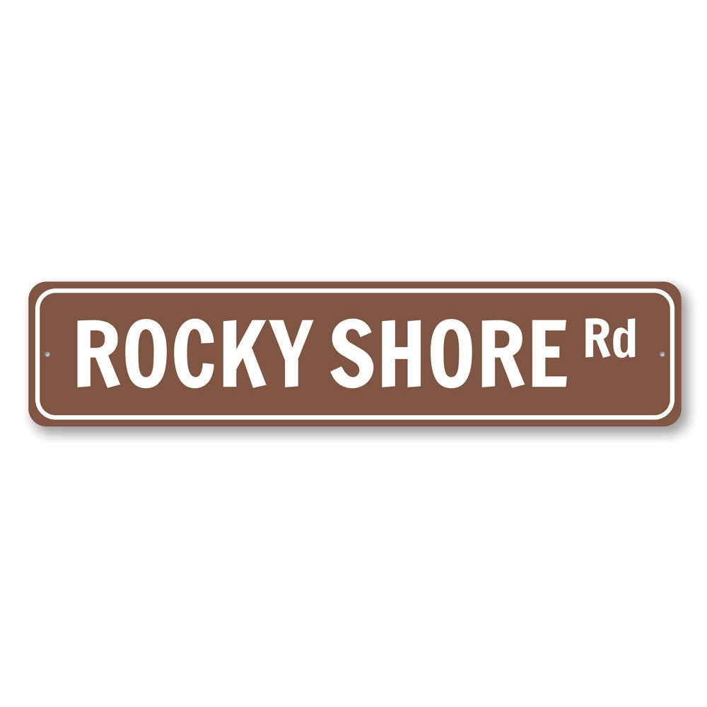 Rocky Shore Road Sign made of high-quality aluminum, featuring a coastal design perfect for beach-themed decor.