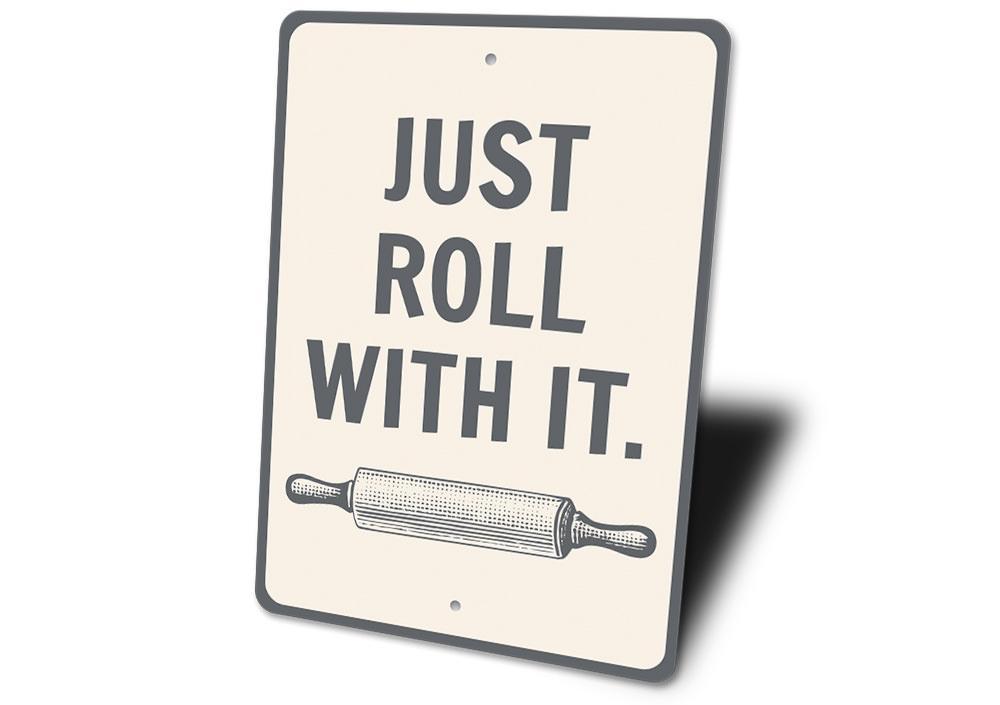 A customizable Roll With It Sign made of high-quality aluminum, featuring a stylish design suitable for various rooms.